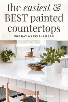 a white counter top sitting next to a wooden chair