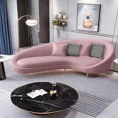 a living room with pink couches and marble coffee table in the center, surrounded by blue curtains