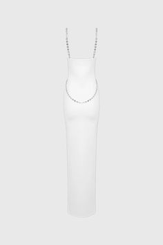 This dress is a stunning bodycon maxi dress that perfectly hugs the figure, highlighting the silhouette. It features chain straps, adding a unique and edgy touch to the overall design. The dress also has chains around the waist, providing an element of glamour and sophistication. The square neckline adds an elegant touch, beautifully framing the collarbone. Made from stretchy fabric, this dress ensures comfort while maintaining its stylish appeal.Fabric: Cotton, Polyester, Elastane Spaghetti Strap Dresses With Chain Strap For Night Out, Chic Evening Body Chain With Chain Strap, Fitted Chain Dresses, Elegant Chain Dress For Night Out, Elegant Evening Dress With Chain Detail, Chic Body Chain With Chain Strap For Night Out, Elegant Backless Dress With Chain Strap, Backless Cocktail Dresses With Chain Strap, Fitted Chain Strap Body Chain For Party