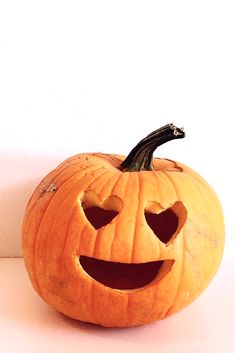 a carved pumpkin sitting on top of a table