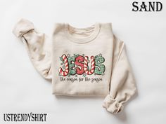 Celebrate the true meaning of Christmas with our "Jesus the Reason for the Season" Sweatshirt and T-Shirt! This faith-inspired design is perfect for those who want to share the message of Jesus during the holiday season. Made from soft and comfortable fabric, this shirt is ideal for Christmas gatherings, church events, or casual winter days. Available in various sizes, it's a thoughtful gift for family, friends, or yourself. Spread the message of love, faith, and the true spirit of Christmas with this beautiful and meaningful apparel! ♥ HOW TO ORDER T-SHIRT ♥ 1- Please, Check and Review all Photos. 2- Choose your size from the drop-down menu and add each shirt to your cart one at a time. 3- Select Your Shirt Color from Drop-down 2 which is Shirt Color. 4- Choose Your TEXT Color. Please add Christmas Christian Shirts, Christmas Jesus Quotes, Christmas Quotes Jesus, Jesus Christmas Shirt, Christmas Christian, Meaning Of Christmas, True Meaning Of Christmas, Church Events, Christmas Jesus