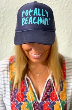 TOTALLY BEACHIN' in aqua on a navy trucker hat with interior french terry sweat band and adjustable snap back. Casual Baseball Cap With Uv Protection For Travel, Adjustable Blue Summer Baseball Cap, Navy Adjustable Baseball Cap For Summer, Blue Snapback Hat For Summer, Casual Lightweight Trucker Hat, Trendy Trucker Hat With Uv Protection, Casual Summer Sports Trucker Hat, Lightweight Casual Trucker Hat, Casual Lightweight Baseball Cap For Beach