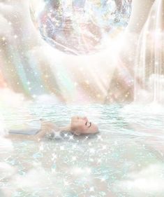 a woman floating on top of a body of water under a rainbow filled sky with stars