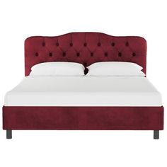 a bed with a red headboard and two pillows on it's sides, against a white background