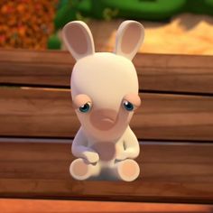 an animated rabbit sitting on top of a wooden bench