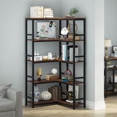 a living room filled with furniture and bookshelves on top of eachother