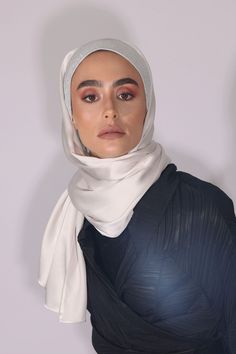 Al Johara is one of our most delicate and sophisticated hijab designs. Pure Satin Silk with shiny and stretchy front fabric. Doesn’t slip, easy to be tied and fixed from behind your head to allow free flow and stability without the need for a front pin or underscarve. However, if you choose to pin it, you can use our collection of the No-Snag Hijab Magnets to save the delicate fabric. 72”x27” Satin Silk, high-shine fabric, very drippy, lightweight, and smooth hijab made especially for those of y Hijab Magnets, Silk Hijab, Hijab Designs, Free Flowing, Satin Silk, Women Supporting Women, Fashion Trend, Silk Satin, Modest Fashion