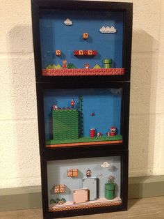 three shelves with mario's world on them