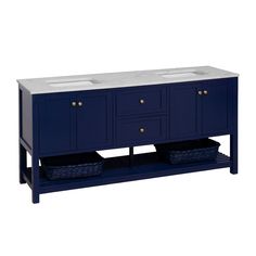 a blue vanity with two sinks and baskets under it