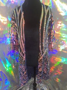 Please advise, Must be worn with care. Sequins may fall out if tugged or worn roughly. Perfect for music festivals and nights out with friends! For Jackets size please review size chart in photos. Please list size and comment box at check out or send DM. Custom sizing available. Please advise, Must be worn with care. Sequins may fall out if tugged or worn roughly. Metallic Disco Outerwear For Party, Metallic Sequined Outerwear For Party, Metallic Sequined Party Outerwear, Metallic Sequin Party Outerwear, Long Sleeve Outerwear For Party And Festival, Sequin Outerwear For Party Season And Festivals, Sequin Outerwear For Party And Festival, Disco Sequined Outerwear For Party, Sequin Disco Outerwear For Party