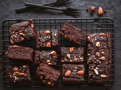 chocolate brownies with almonds on a cooling rack