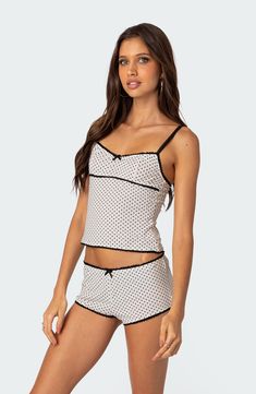 Dainty picot trim edges a slim and stretchy cami perfected with polka dots. V-neck Adjustable straps 95% polyester, 5% spandex Machine wash, dry flat Imported Shorts Pajamas, Top With Shorts, Mini Bow, Pajamas Sets, Women Y2k, Lace Splicing, Short Pajama Set, White Tank Top, Cami Top