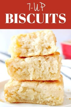 three pieces of cake sitting on top of a white plate with the words, 7 - up biscuits