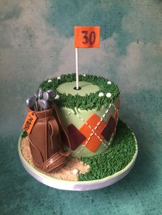 a golf themed birthday cake on a table