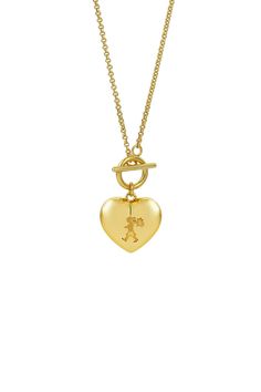 Runaway Heart Necklace Gold-Plated The iconic Runaway Girl is now wrapped in love, transforming into the Runaway Heart. The exaggerated, puffy heart highlights the Runaway Girl with a chic, modern twist on the traditional Victorian heart. Discover the Runaway Heart in gold plate, suspended from a delicate belcher chain and t-bar.  This necklace is electroplated with 2 micron of 14-carat yellow gold, covering a 925 sterling silver base.  - Chain Length 45 cm  - Total Drop - 24.5 mm  - Heart Height - 15 mm  - Heart Width - 15.5 mm Yellow Gold Plated Heart Pendant Necklace, En Route Heart Necklace, Elegant Gold-tone Heart Charm Necklace, Elegant Yellow Heart Pendant Necklace, Yellow Gold Heart Pendant Charm Necklace, Fine Jewelry, Gold Heart Necklace, Puffy Heart, Karen Walker, Chain Lengths