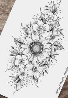 a black and white drawing of flowers on a piece of paper with watermarking