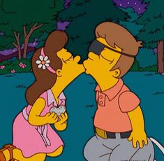 the simpsons is kissing his daughter on the cheek in front of some trees and grass