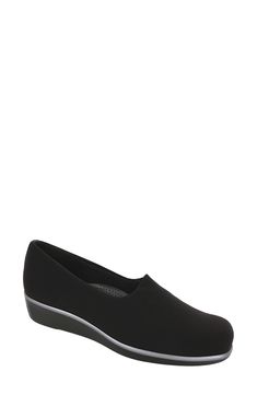 Designed with TRIPAD technology for all-day comfort and support, this slip-on shoe is a smart choice for everyday ensembles. Lightweight: puts cushioning and performance underfoot with an emphasis on streamlined comfort Cushioned footbed with arch support Leather upper/textile lining/synthetic sole Made in the USA Black Slip-ons With Ortholite Insole, Modern Black Synthetic Slip-ons, Modern Synthetic Slip-resistant Slip-ons, Modern Black Slip-ons With Removable Insole, Comfortable Black Slip-ons For Work, Black Slip-ons For Work, Black Slip-ons With Arch Support For Work, Classic Black Slip-ons With Arch Support, Shoe Women