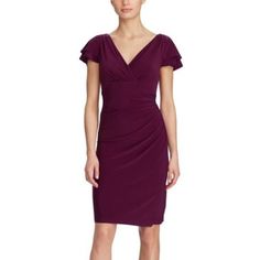 This Beautiful Plum Lauren Ralph Lauren V-Neck Ruched Flutter Sleeve Dress Has A Beautiful Color And Has A Lot Of Stretch To It. The Material Is 95% Polyester And 5% Elastane, And The Color Is A True Plum Purple- Exotic Ruby Red, And Is An Absolute Stunner. Tailored With Flirty Flutter Sleeves And A Color That Is Great For The Fall, Lauren Ralph Lauren's Dress Is The Epitome Of Effortless Feminine Style In Slinky, Body-Skimming Matte Jersey. Crossover Ruched V-Neckline Flutter Sleeves With Soft Elegant Purple Dress With Surplice Neckline, Purple Ruched V-neck Dress, Purple Fitted Dress With Flutter Sleeves, Fitted Purple Dress With Flutter Sleeves, Fitted Purple Dresses With Flutter Sleeves, Crossover Skirt, Ralph Lauren Dress, Flutter Sleeve Dress, Plum Purple