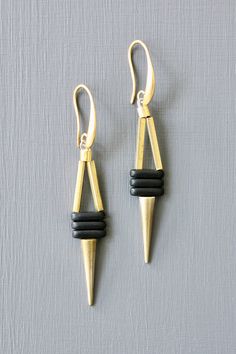 18k Gold plated brass hooks with glass and brass. Each earring weighs .085 oz. and measures 2.375 inches in length from top to bottom. Black Brass Earrings With Ear Wire, Gemini Bracelet, Pisces Bracelet, Aries Bracelet, Designer Handmade Jewellery, Brass Hook, Spike Earrings, Gift Card Sale, Multi Strand Necklace