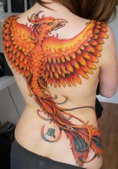 the back of a woman's body with an orange and red bird on it