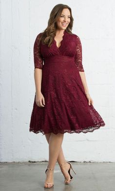 This elegant short dress features an A-line midi dress will have all eyes on you. This design was inspired by our best-selling plus size dress and boasts some of the same fabulous features. With gorgeous scalloped lace and classic A-line skirt, you'll feel exquisite no matter the occasion This dress is perfect for any special occasion. Made in the USA Length : Knee Length Sleeve Style : 3/4 Sleeve Colors : Onyx, Sapphire Blue, Pinot Noir, Teal Abyss Sizes : 0X, 1X, 2X, 3X, 4X, 5X Fully Lined Occ Plus Size Dressy Tops, Plus Size Holiday Dresses, Ideas Bautizo, Plus Size Wedding Dresses With Sleeves, Gaun Koktail, Lace Dress Design, Sukienki Plus Size, Plum Dress, Gaun Fashion