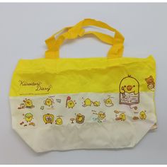 Gachapon Kiiroitori Rilakkuma San-X Small Tote Bag. This Bright Yellow Kiiroitori Rilakkuma San-X Small Tote Bag Is Perfect For Any Woman On The Go. Made Of Durable Nylon, It Can Withstand The Wear And Tear Of Daily Use. The Tote Features The Iconic Sanrio Character, Kiiroitori, Making It A Must-Have For Any Sanrio Fan. The Bag Has Ample Space To Hold All Of Your Essentials. Kawaii Yellow Travel Bag, Yellow Kawaii Travel Bag, Yellow Kawaii Style Travel Bags, Kawaii Yellow School Bag, Yellow Kawaii School Bag, Kawaii Shoulder Bag For Shopping, Kawaii Satchel Tote For Daily Use, Kawaii Multicolor Bags For Everyday Use, Kawaii Tote Shoulder Bag For Shopping