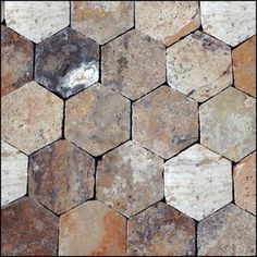 an image of hexagonal stone tiles that look like hexagons in different colors