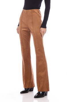 Vertical pintuck pleats create an elongating effect on this supple faux-suede pants that easily transition from the office to happy hour. 31 1/2" inseam; 21 1/2" leg opening; 10 3/4" front rise; 15" back rise (size Small) Concealed-elastic waist 93% polyester, 7% spandex Hand wash, dry flat Made in the USA of imported fabric Pintuck Pleats, Suede Pants, Nordstrom Store, Pin Tucks, Happy Hour, Faux Suede, The Office, The Twenties, Elastic Waist