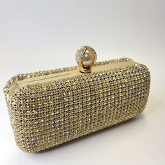 Gold Tone Evening Clutch Purse With Sparkling Silver Tone Clear Crystal Rhinestones This Purse Shimmers With A Crystal Diamante Effect, It Totally Exudes The Ultimate Glamour And Sophistication Of Every Sexy Hot Fashionista Wear It As A Hand Held Clutch Or Wear It Over The Shoulder Or Use As A Crossbody Purse When Wining And Dining, Mingling And Dancing. Brand New ! - Never Used, Never Worn See Measurements In Listing Abv Approx. Length: 7" Width: 3" Height: 2" Optional Long Gold Tone Chain Stra Elegant Bedazzled Silver Bridal Accessories, Elegant Silver Bedazzled Bridal Accessories, Party Crystal Embellished Bridal Accessories, Evening Bridal Accessories With Rhinestones, Elegant Bedazzled Bridal Accessories For Party, Silver Bedazzled Bridal Accessories For Party, Crystal Rhinestone Bridal Accessories For Party, Crystal Bridal Accessories With Rhinestones For Party, Glamorous Crystal Bridal Accessories For Party