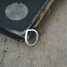 Silvery Eve droplet ring in solid silver | Etsy Silver Teardrop Stackable Rings As Gift, Elegant Silver Teardrop Stackable Rings, Modern Teardrop Anniversary Rings, Classic Sterling Silver Teardrop Ring, Minimalist Sterling Silver Teardrop Rings, Elegant Sterling Silver Teardrop Stackable Rings, Modern Silver Teardrop Ring, Teardrop Promise Ring With Polished Finish, Sterling Silver Teardrop Rings