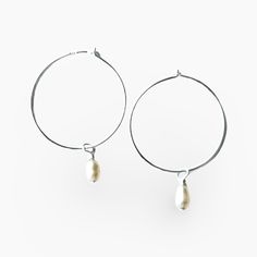 Our Da Hoop 1" Sterling Silver earrings are handmade and are one of our all-time most popular sellers. These sterling hoops go with everything for that everyday style you can't live without! Add a touch of class to any outfit with these sparklers. Available in an assortment of gemstone, glass and metal beads. Made in Hawaii. 1" HoopSterling Silver ***SALE ON THIS ITEM IS FINAL - NO RETURNS ACCEPTED FOR THIS ITEM**** Hypoallergenic Dangle Hoop Earrings For Everyday, Modern Small Hoop Earrings With Pearl Drop, Modern Small Hoop Pearl Drop Earrings, Nickel-free Dangle Hoop Earrings For Everyday, Everyday Nickel-free Dangle Hoop Earrings, Everyday Nickel Free Dangle Hoop Earrings, Sterling Silver Hoop Earrings With Pearl Drop For Everyday, Everyday Sterling Silver Hoop Earrings With Pearl Drop, Adjustable Hypoallergenic Teardrop Hoop Earrings