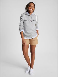 Tommy Hilfiger women's hoodie. Ideal for year-round wear, our medium weight hoodie is made from cotton-blend fleece that feels soft against your skin. Designed with a drawstring hood and ribbed trim, this sporty pullover is made complete with our embroidered logo at the chest.  Material: 70% Better Cotton Initiative (bci) Cotton, 30% Polyester. Fleece Hoodie Sweatshirt, Tommy Hilfiger Fall Sweatshirt With Drawstring Hood, Tommy Hilfiger Cotton Hoodie Sweatshirt, Tommy Hilfiger Hooded Hoodie With Drawstring, Tommy Hilfiger Hoodie With Drawstring Hood, Tommy Hilfiger Sporty Hoodie With Drawstring Hood, Tommy Hilfiger Fall Hoodie, Tommy Hilfiger Long Sleeve Hoodie With Drawstring Hood, Tommy Hilfiger Long Sleeve Cotton Hoodie