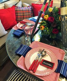 the table is set with red, white and blue place settings