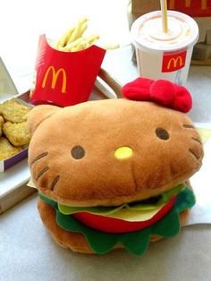 a hello kitty burger and fries on a table