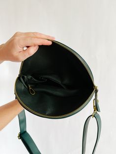 Our newest any-way, hands-free pack now in vegan leather! Wear this stunning Evergreen bag cross body across your chest or to your hips, around your waist as a belt bag, or over your shoulder as your new on-the-go purse. The options are endless no matter what size you are or how you want to wear it. The strap can easily clip or unclip for adjusting and lengthens up to 46 inches. Add a fabric strap for a more casual look! dimensions:9.25" across top (folded)8" across bottom1.5" deep6.5" high (fol Green Everyday Belt Bag With Adjustable Strap, Green Belt Bag With Zipper Pocket For Everyday Use, Green Belt Bag For Everyday Use, Versatile Green Belt Bag With Adjustable Strap, Versatile Green Belt Bag, Green Crossbody Belt Bag For Everyday Use, Green Shoulder Belt Bag For Everyday Use, Everyday Green Shoulder Belt Bag, Versatile Green Belt Bag With Removable Pouch