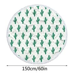 a round beach towel with green cactus print on the front and bottom, in white background