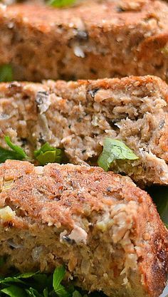 two meatloaf patties on a plate with lettuce