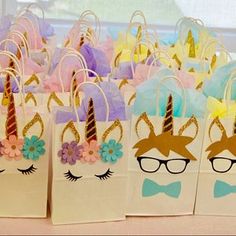 small bags with unicorn faces and glasses on them