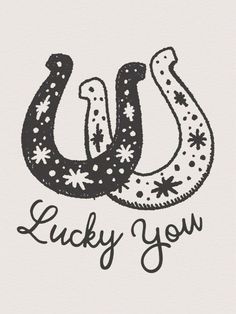 the words lucky you are written in black ink on a white background with an image of a