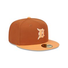 The Detroit Tigers Color Pack Earthy Brown 59FIFTY Fitted Cap features an embroidered Tigers logo at the front panels with a matching MLB Batterman logo at the rear, an orange glaze visor, and a gray undervisor. Brown Snapback Hat For Sports And Baseball Season, Casual Orange Hat With Embroidered Logo, Brown Snapback Sports Hat, Brown Sports Visor Snapback Hat, Brown Flat Brim Baseball Cap For Sports, Orange Baseball Cap For Sports Events, Orange Curved Brim Sports Hat, Orange Casual Baseball Cap For Sports Events, Orange Snapback Hats For Sports Events