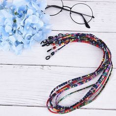 Hign-concerned Chemical : None Pattern Type : Geometric Model Number : Eyeglasses Strap Item Length : 68cm Material : COTTON Gender : Unisex Features: Eyeglass spectacles chain holder to keep your glasses safe and secure. Made in a neutral colour so they will complement any outfit. Suitable for: Optical frames, reading glasses, sunglasses and other glasses Specifications: Quantity:5Pcs/Lot Length:68*0.5cm/26.78*0.2in(Approx.) Material:Cotton Package Include:5Pcs/lot Eyeglass Chain Strap Note: 1. Glasses Necklace, Eyeglass Strap, Neck Lanyard, Glasses Strap, Sunglasses Strap, Tiger Eye Crystal, Retro Video, Eyeglass Chain, Personalized Pendant