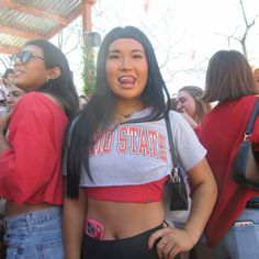 a group of young women standing next to each other