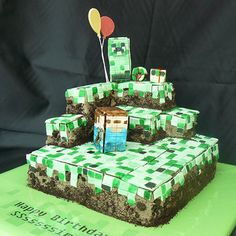 a cake made to look like it has money on top and balloons in the middle