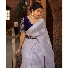 Light Lavender colored saree is made from georgette fabric which is highlighted with zari striped weaving work as shown. comes along with embroidered rangoli silk blouse which you can customise as per your design/style with embroidered belt. Occasion - You can wear this saree for parties, functions and events. Note:- the actual product may differ slightly in color and design from the one illustrated in the images when compared with computer or mobile screen. Measurements: Saree : Georgette : 5.5 Saree Georgette, Embroidered Belt, Saree Models, Light Lavender, Mobile Screen, Georgette Saree, Georgette Fabric, Lavender Color, Georgette Sarees