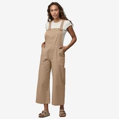 Overalls meet our beloved Stand Up® Shorts in a cropped silhouette. Comfortable, versatile and made for getting dirty in the garden, they are constructed of our classic organic cotton Stand Up canvas with a touch of stretch. Made in a Fair Trade Certified™ factory. | Patagonia Women's Stand Up® Cropped Overalls in Oar Tan, Size 10 - Outdoor Clothing - Organic Cotton/Spandex Cotton Overalls, Utility Jumpsuit, Knit Shift Dress, Shank Button, Woman Standing, Overalls Women, Patagonia Womens, Fabric Details, Outdoor Outfit