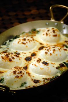 some eggs are sitting in a pan on the table