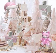 there is a pink teddy bear sitting in front of the christmas tree and other decorations