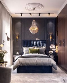 a bedroom with a large bed and chandelier hanging from the ceiling