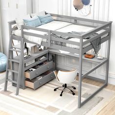 a loft bed with drawers underneath it and a desk under the bed in front of it